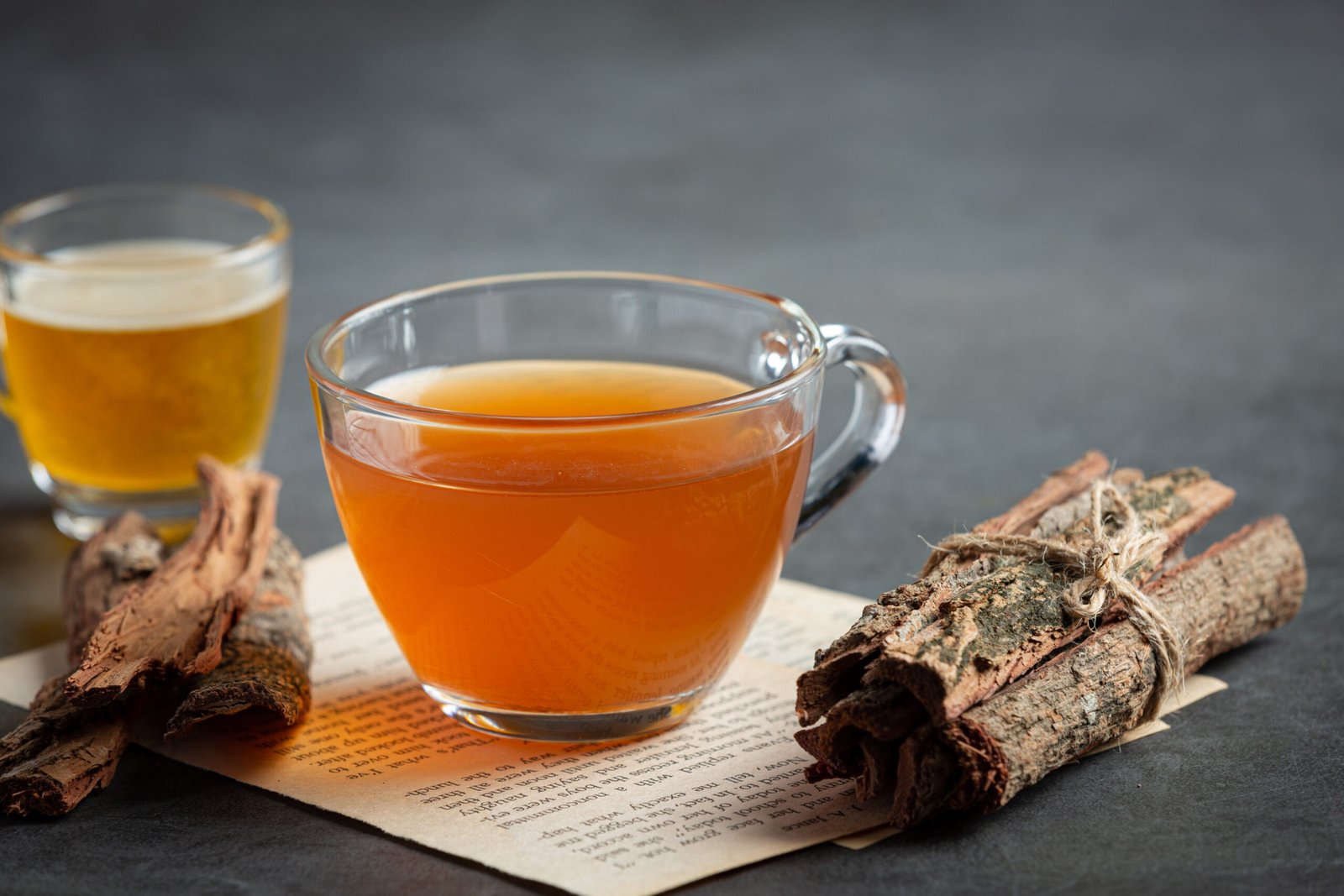 hot tea and bark on table